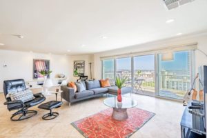 Living Room with rugs of an Ocean View Apartment in Santa Monica at the Bay Tower